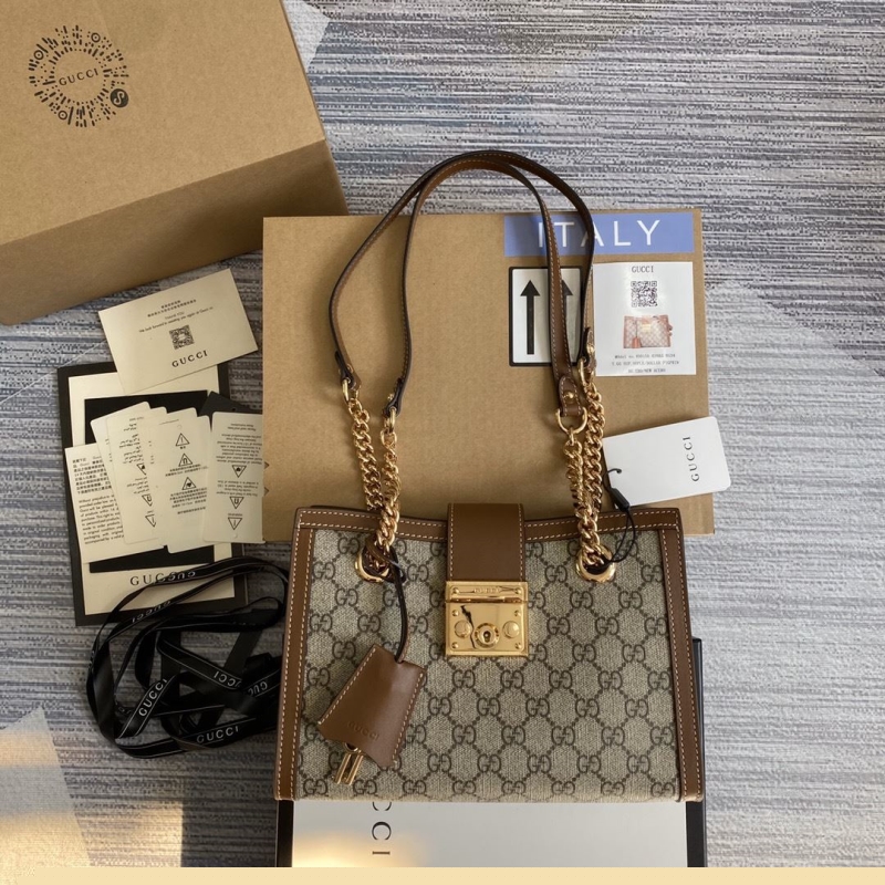G*u*i top handle bags